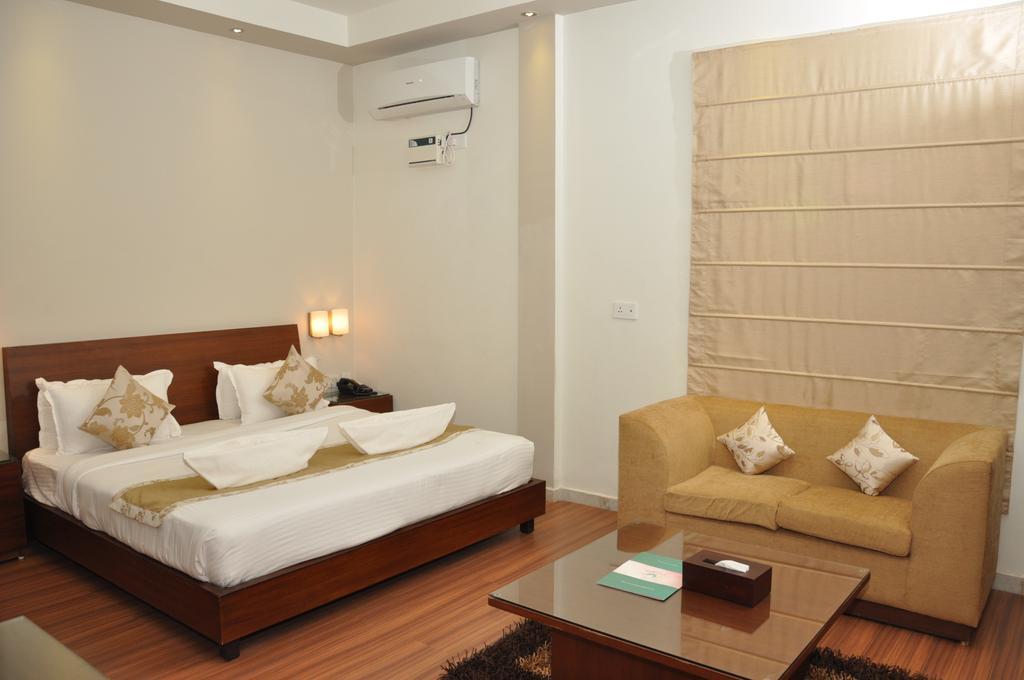 Sukhmantra Resort & Spa Candolim Quarto foto
